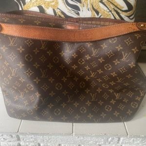 Authentic Womens Louis Vuitton delightful Monogram handbag.